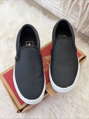 Vans Black Slip-On Sneakers with White Sole